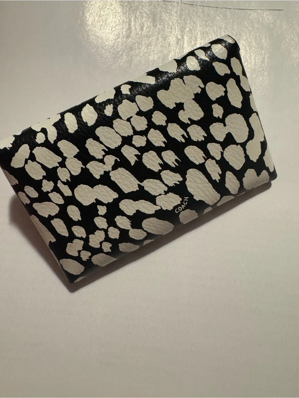 Coach abstract turnlock leather card case